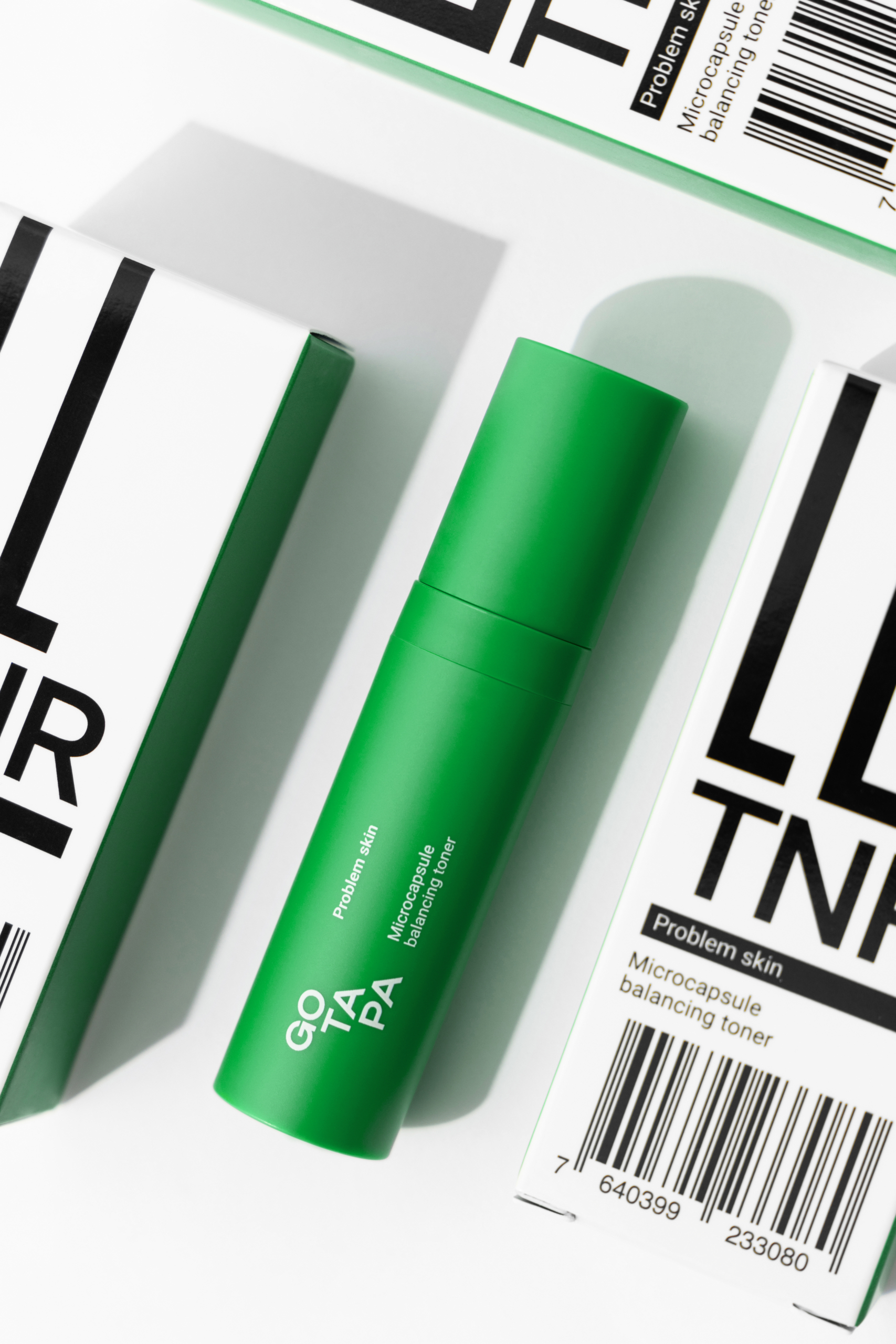 Microcapsule balancing toner